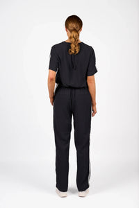 KNEWE Label women's K1049 Universal Jumpsuit Ink Off in White - close-up fabric detail