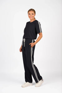 KNEWE Label women's K1049 Universal Jumpsuit Ink Off in White - close-up fabric detail