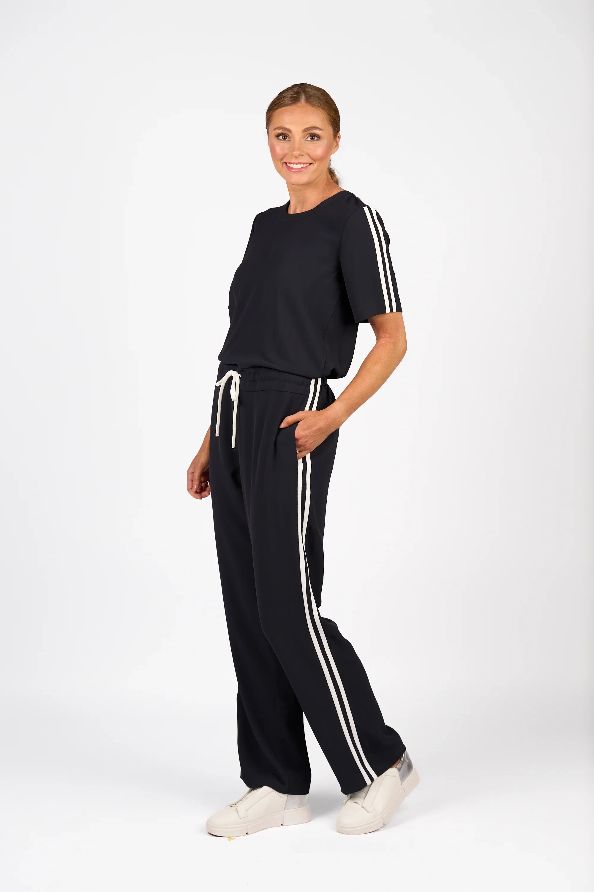 KNEWE Label women's K1049 Universal Jumpsuit Ink Off in White - close-up fabric detail