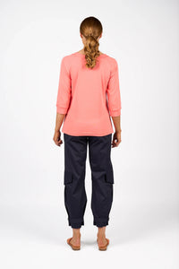 KNEWE Label women's K3051 Status Tee in Coral - close-up fabric detail