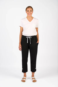 KNEWE Label women's K7076 Checker Pant Black in White - close-up fabric detail