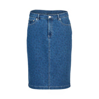 The Vassalli Poppy Skirt - Kansas Denim is a blue, knee-length stretch denim skirt with front pockets, belt loops, a button and zip closure, subtle faded detailing, and a straight slim fit.