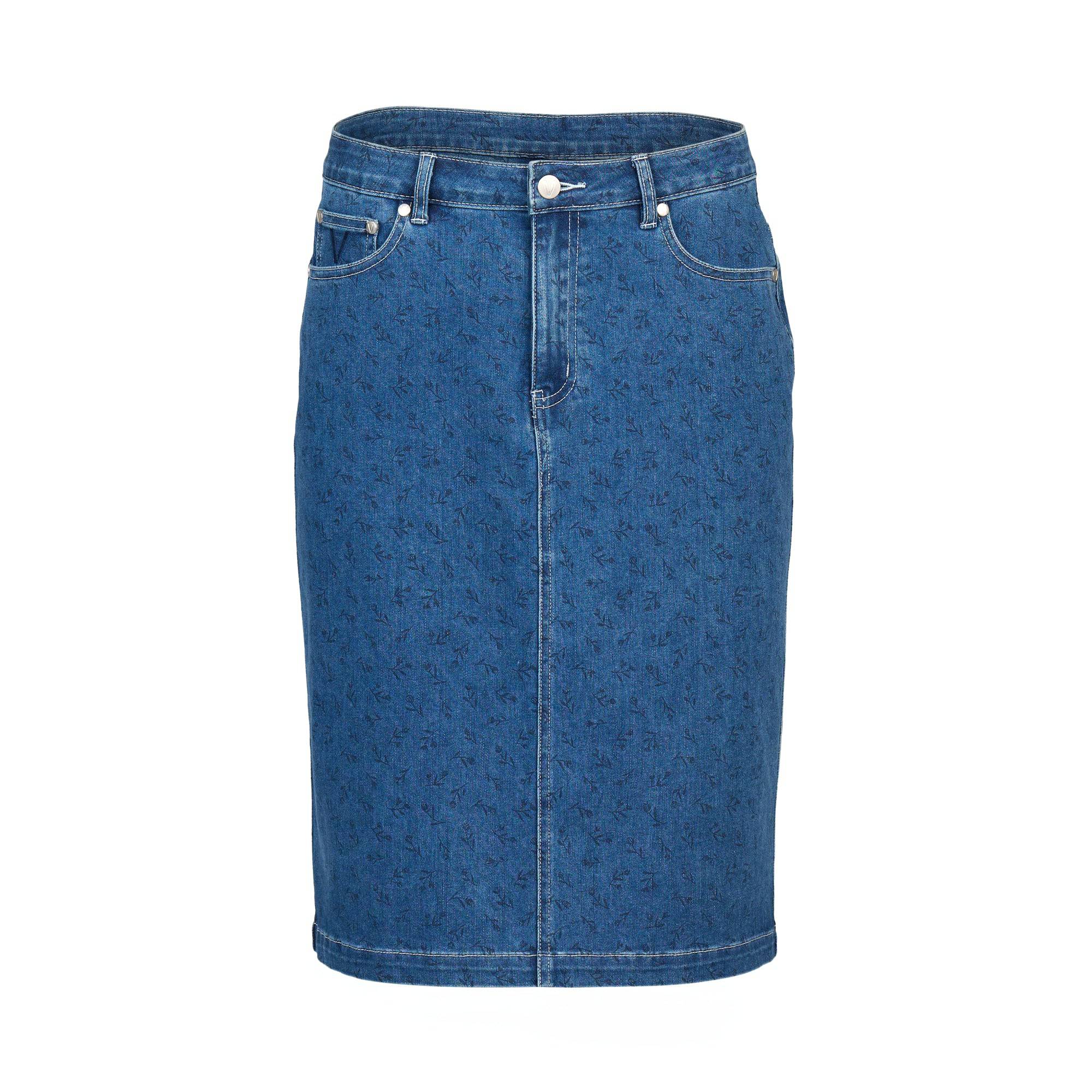 The Vassalli Poppy Skirt - Kansas Denim is a blue, knee-length stretch denim skirt with front pockets, belt loops, a button and zip closure, subtle faded detailing, and a straight slim fit.