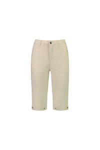 The Vassalli Custom Poplin Short in Sand is made from lightweight stretch poplin and features front and back pockets, belt loops, button and zipper closure, and cuffed hems with stylish button details, shown on a white background.
